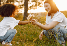 spring mindfulness with a mom and child picking flowers